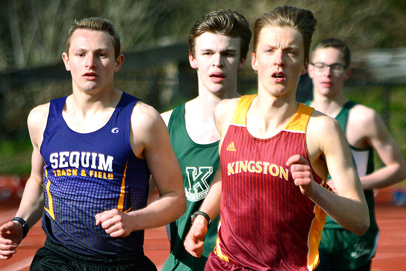 Stefans Lusis of Kingston is the defending Olympic League and WCD III 3,200-meter champion and will face challengers both old and new this spring, including Lucas Becker of Klahowya (center) who is running track for the first time. (Mark Krulish/Kitsap News Group)