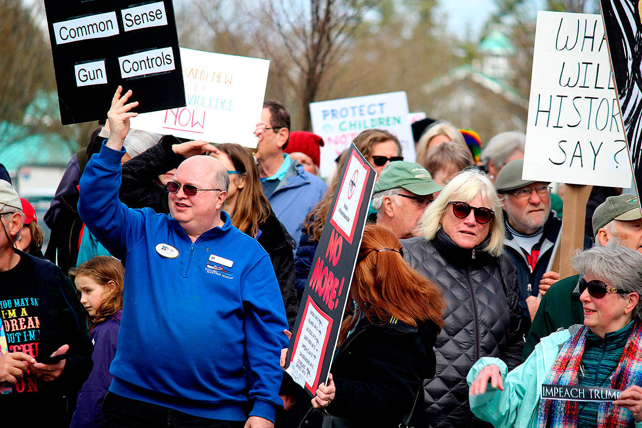 More than 100 Kitsap County residents gathered together to March for Our Lives March 24, promoting school safety and gun control.                                Michelle Beahm / Kitsap News Group