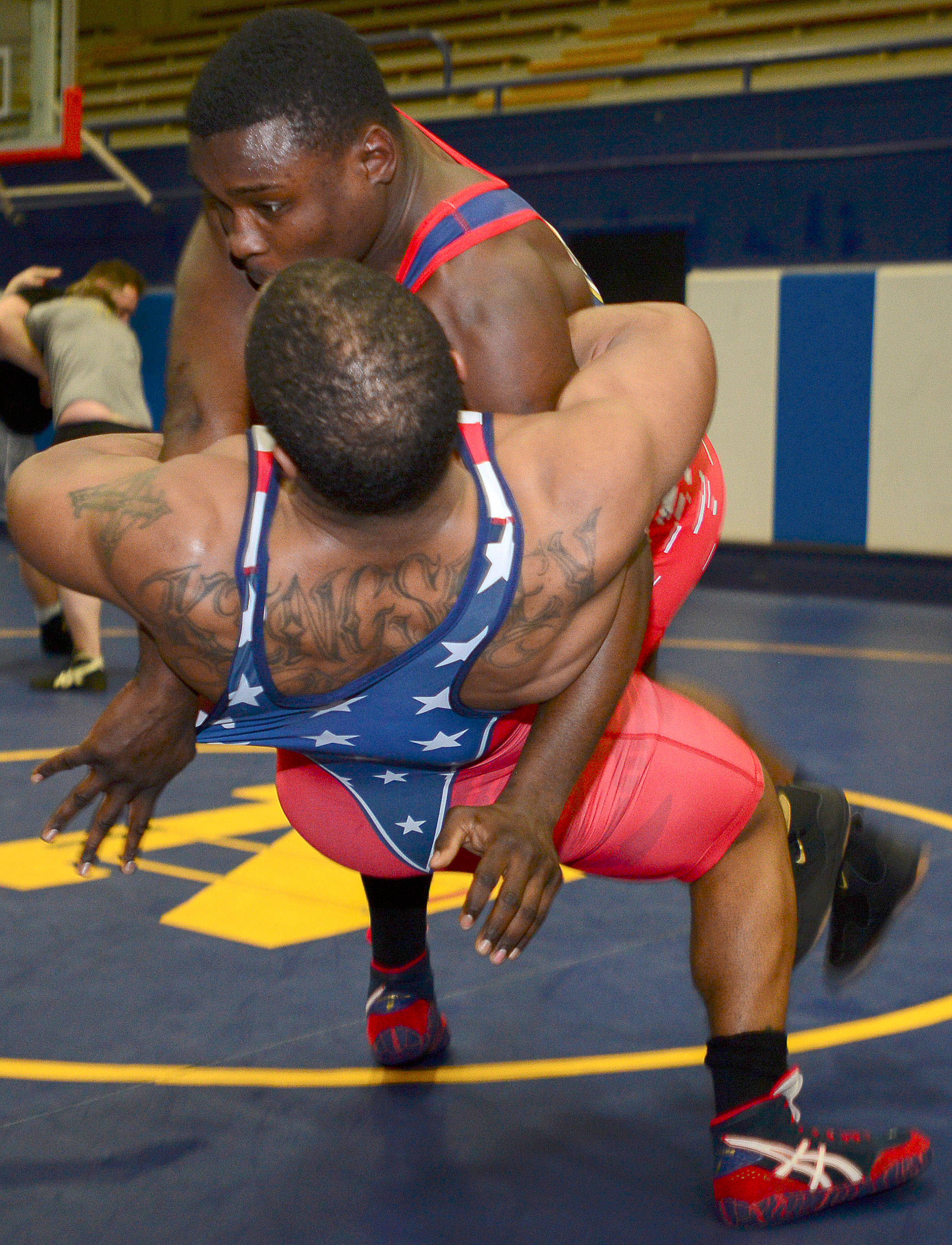 Interior Communications 2nd Class Austin Craig and Culinary Specialist Seaman Derekston Williams participate in situational drills during the All-Navy Wrestling Team practice at Naval Base Kitsap-Bremerton’s fitness center. The All-Navy Wrestling Team is preparing for the 2018 Open Wrestling Championships.                                Mass Communication Specialist 3rd Class Christopher Jahnke / U.S. Navy