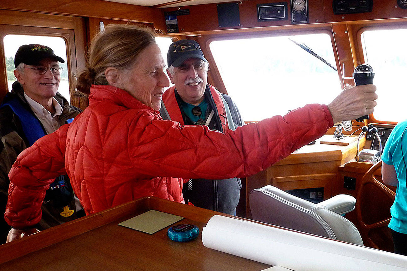 A student practices navigation while underway during practical hours of a Bremerton Sail and Power Squadron class.                                Rick Hurst / Bremerton Sail and Power Squadron