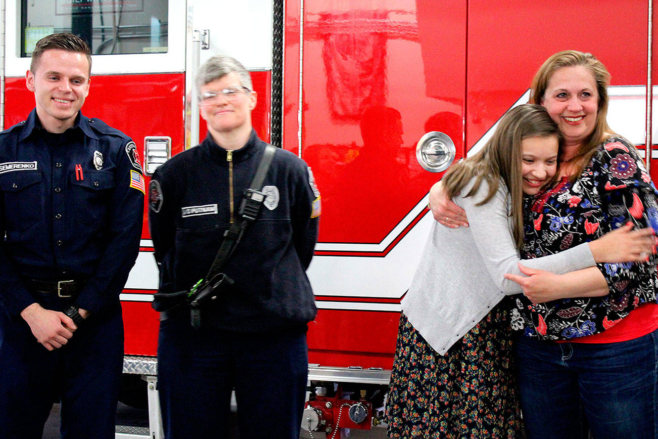 &lt;em&gt;Left to right: Ivan Semerenko, Kara Putnam, Elyza Gutierrez and Jennifer Gutierrez at the recognition for Elyza’s early CPR on her mom during an emergency Nov. 10.&lt;/em&gt;                                Michelle Beahm / Kitsap News Group