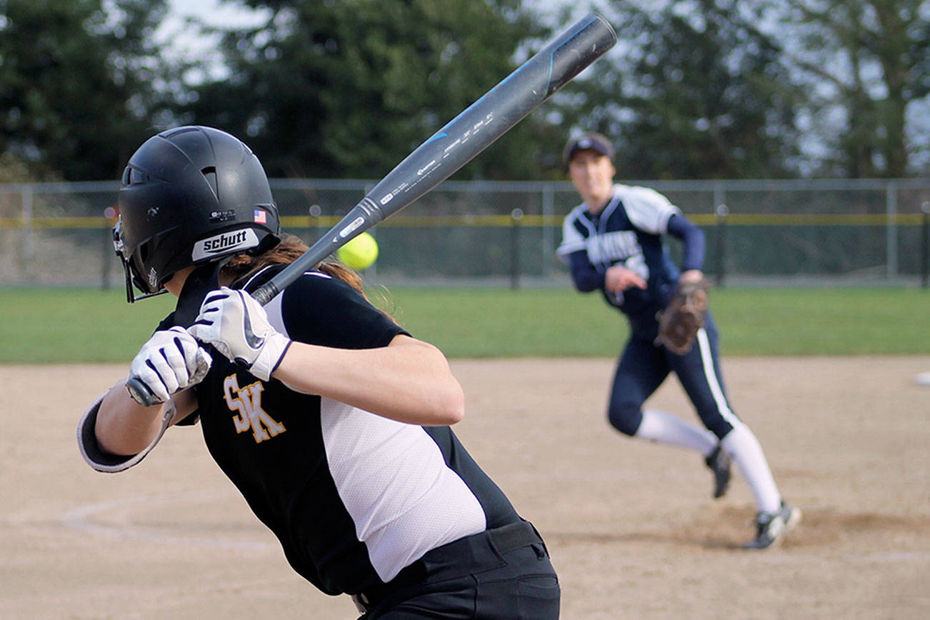 South Kitsap senior Statia Cermak eyes an incoming pitch during the game against Bellarmine Prep on April 2. The Wolves won 18-5. Jacob Moore | Kitsap Daily News