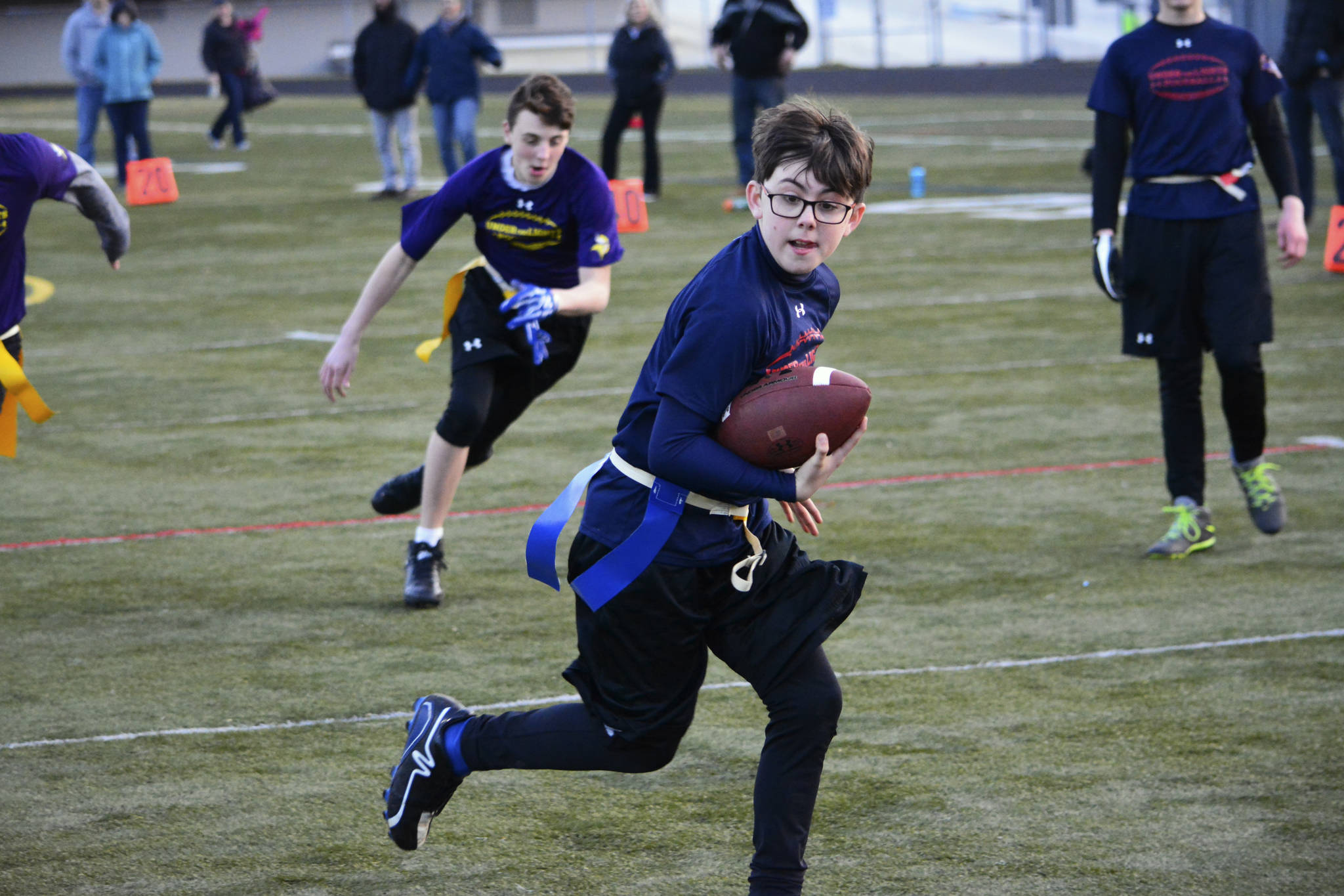 An athlete runs the ball during a championship game on March 31. Over 100 children were involved in the league. Mark Krulish | Kitsap Daily News