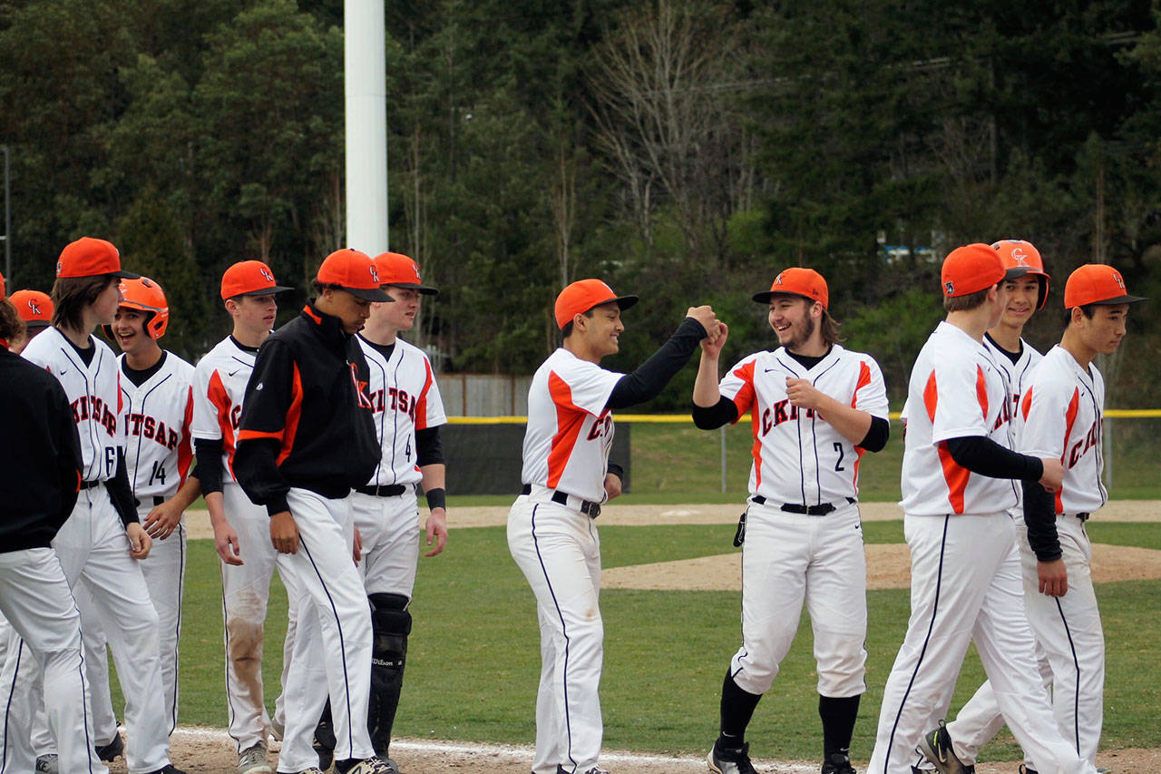 Cougars baseball comes together as a team after scoring their fourth and final run of the contest to barely squeeze by Capital for the victory. Jacob Moore | Kitsap Daily News