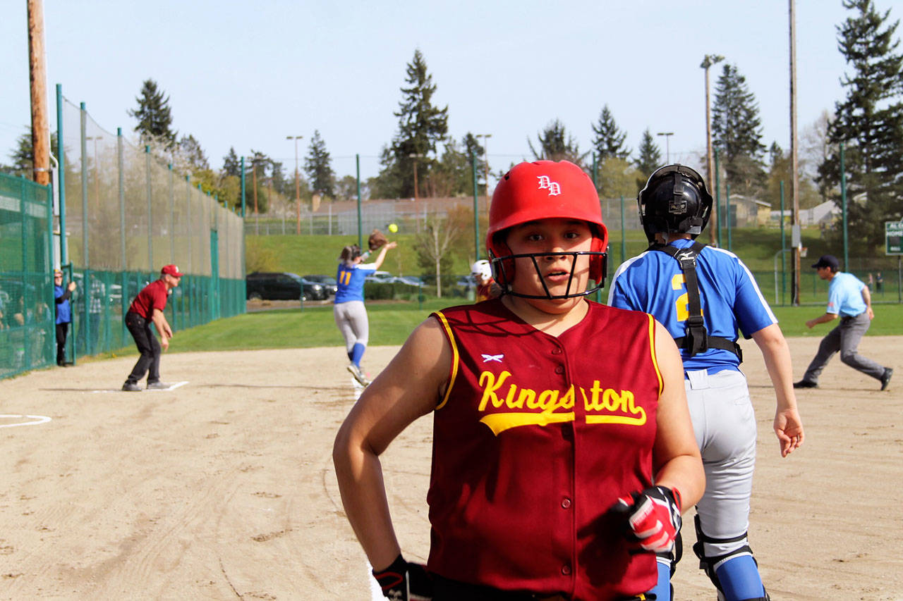 Kingston junior Lucille Schaeffer comes around to score on an error in the first inning after singling just minutes earlier. Jacob Moore | Kitsap Daily News