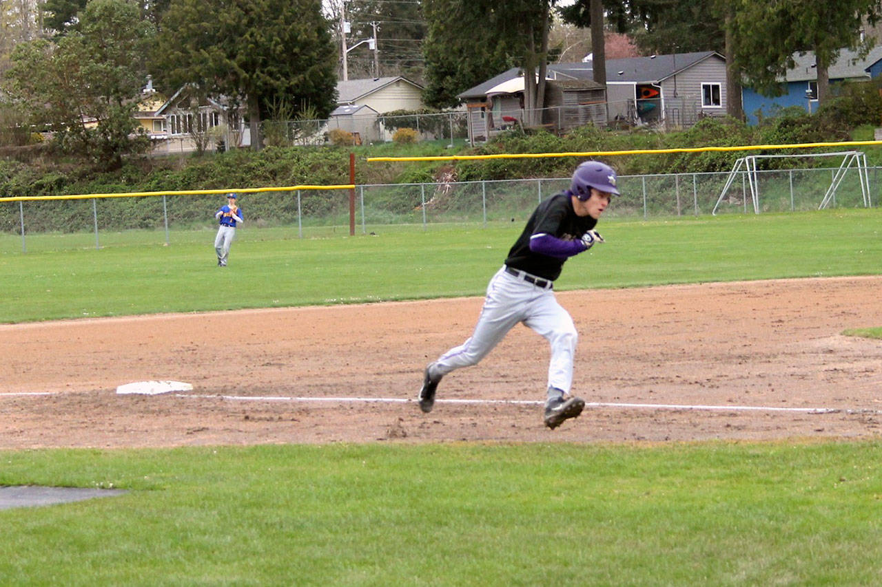 Max Larsen rounds third shortly before scoring for the Vikings. North Kitsap beat the Knights by a final score of 17-3. Jacob Moore | Kitsap Daily News