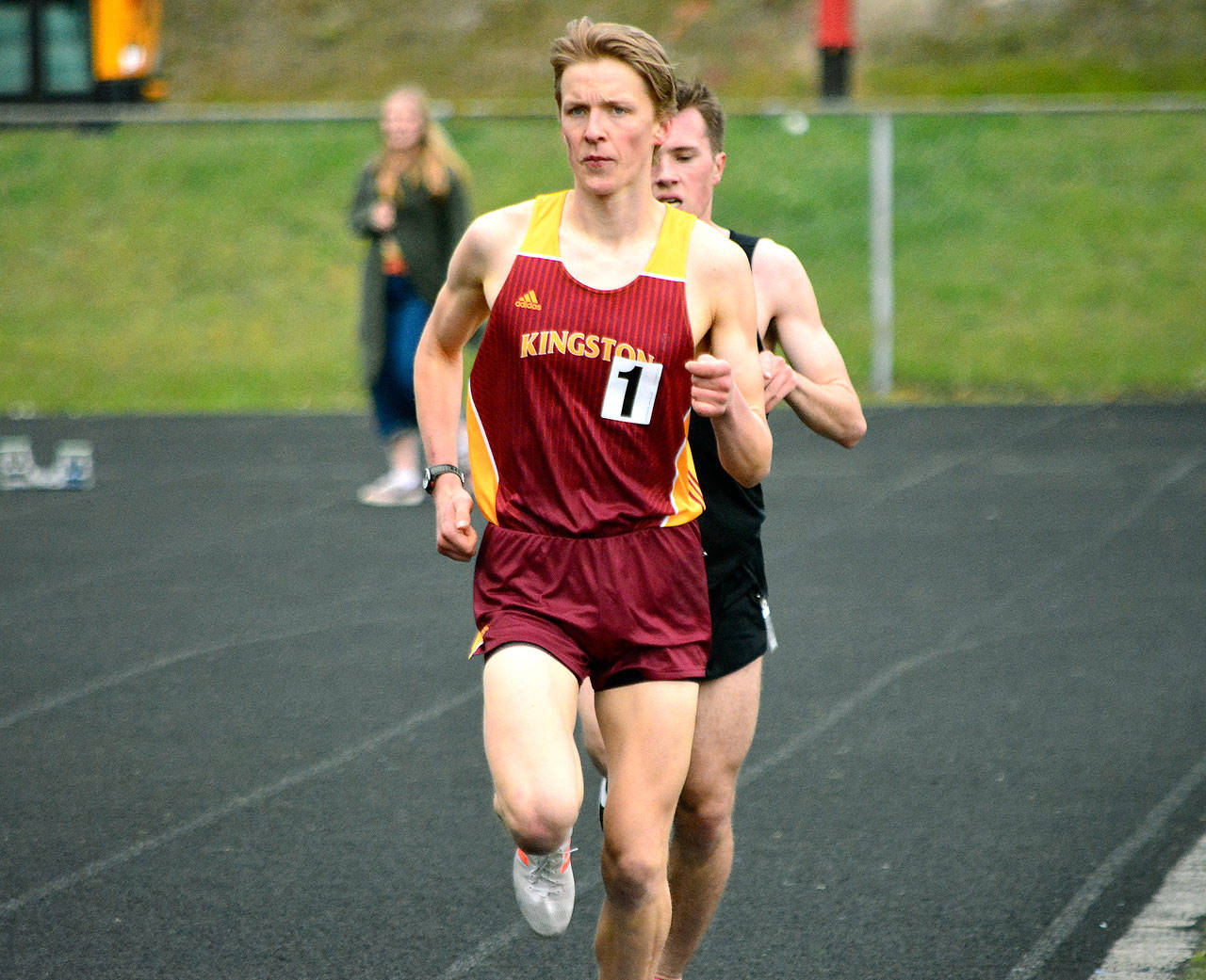 Kingston’s Stefans Lusis takes home the top prize in the boys 3,200-meter run. He set a new meet record with a time of 9:51.57. (Mark Krulish/Kitsap News Group)