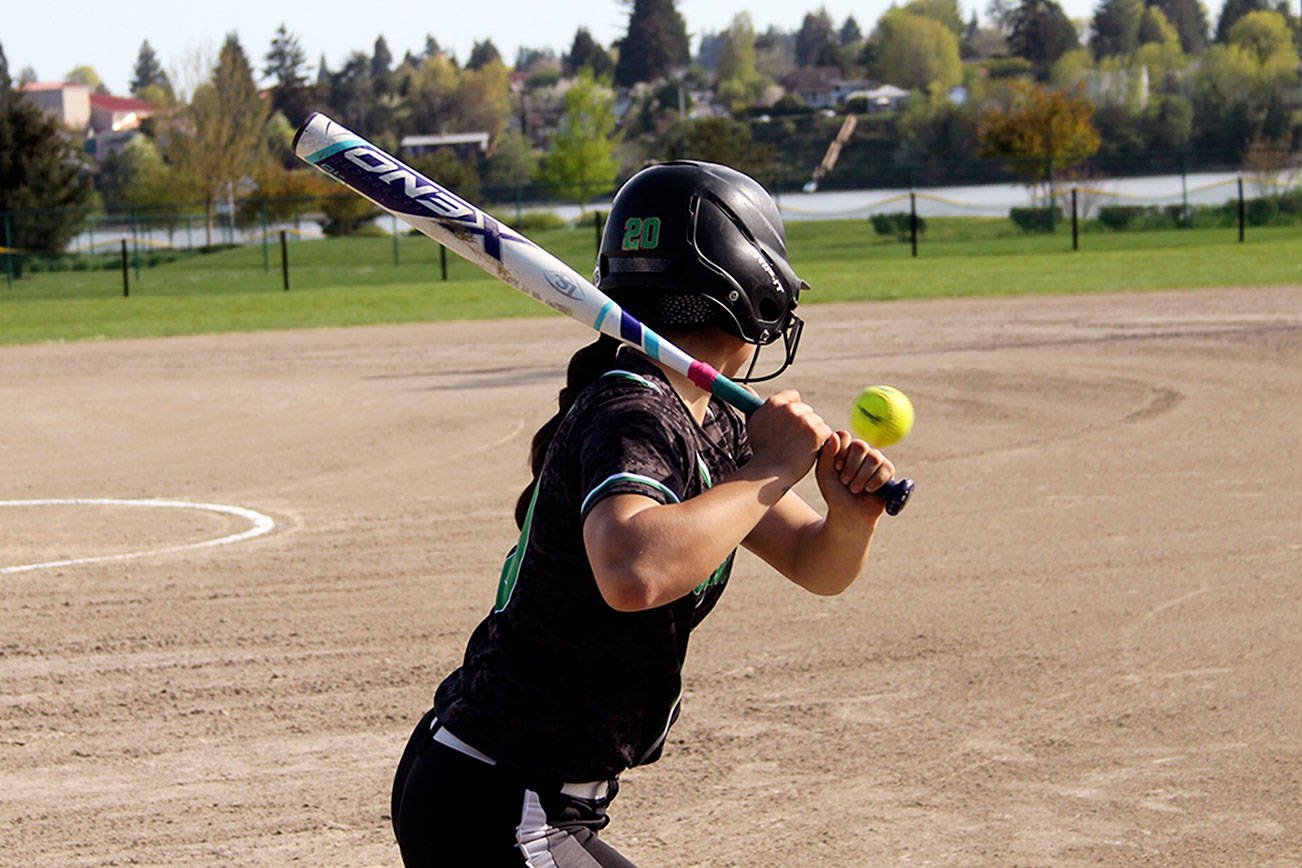 Eagles senior Amber Bumbalough watches as a pitch comes sailing in. She finished a single away from the cycle. Jacob Moore | Kitsap Daily News