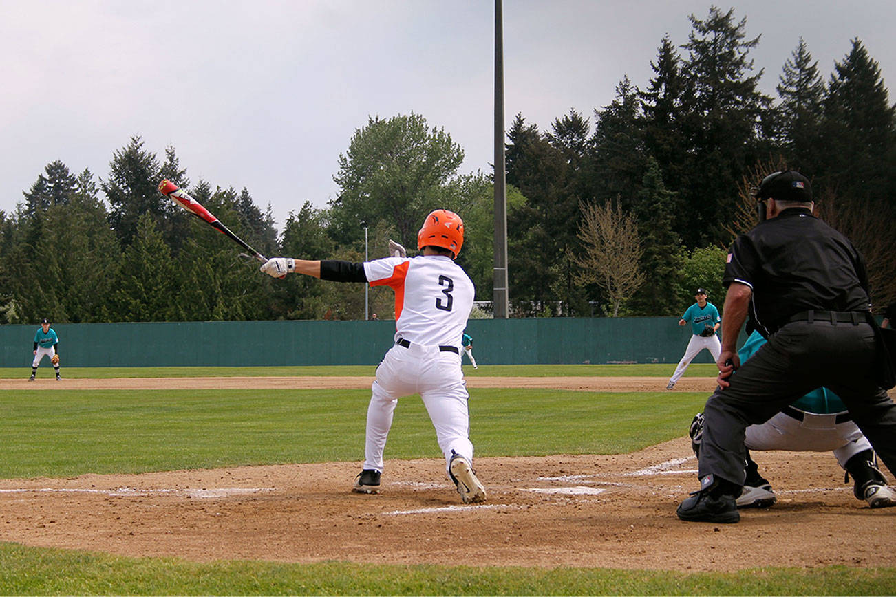 Cougars senior Rylee Orteza fouls off a pitch in the fifth inning of his team’s first game against Spanaway Lake on May 5. Jacob Moore | Kitsap Daily News
