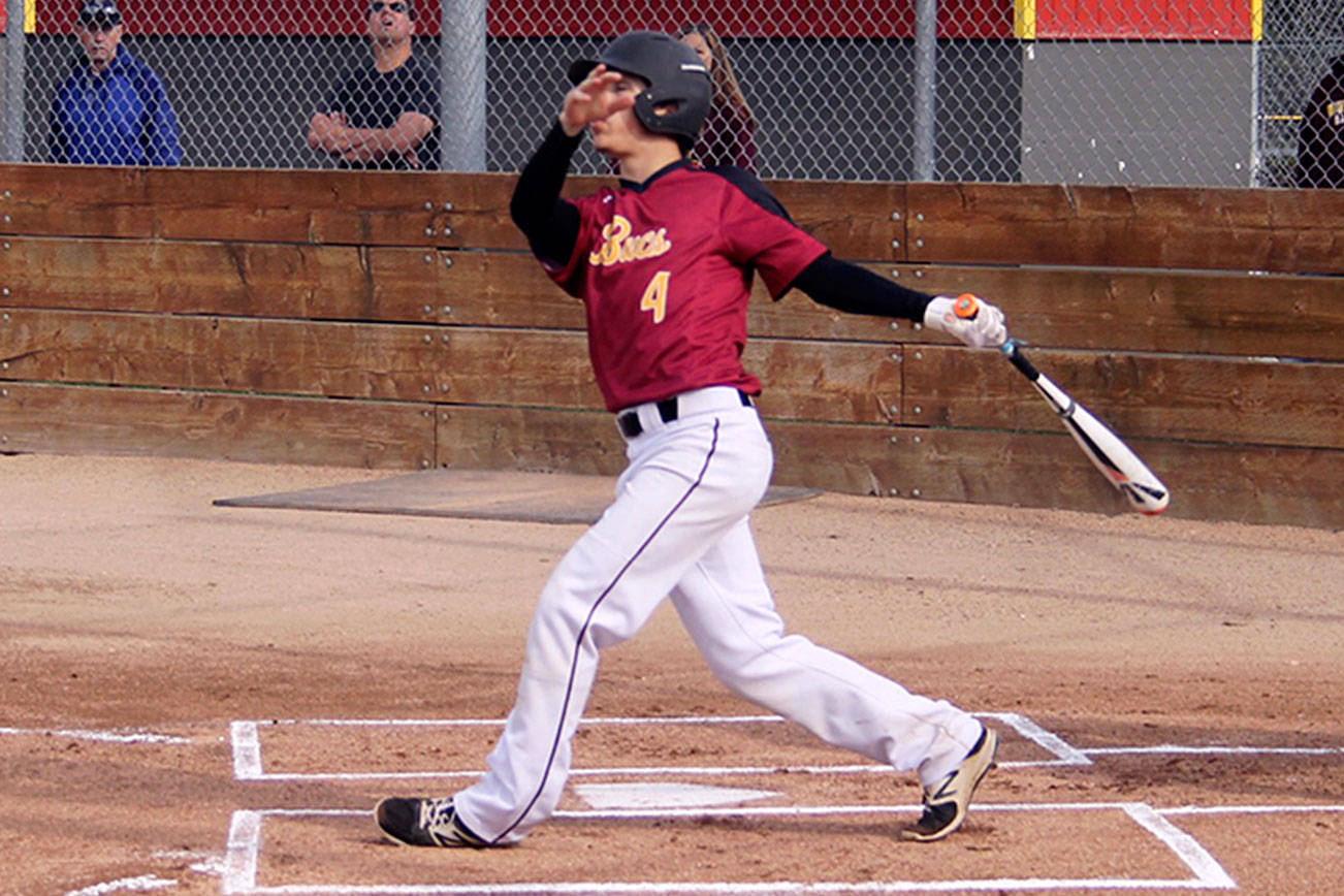 Kingston senior infielder Ethan Sax takes a hack in the first inning of a game against White River on May 5. Jacob Moore | Kitsap Daily News