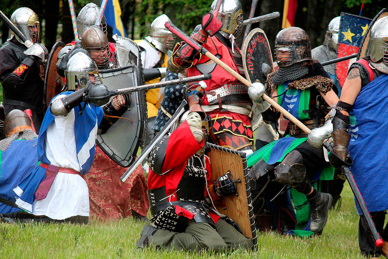 Heavy fighting will be on display at the Kitsap Medieval Faire, in both war scenarios and one-on-one combat.                                Michelle Beahm / Kitsap News Group