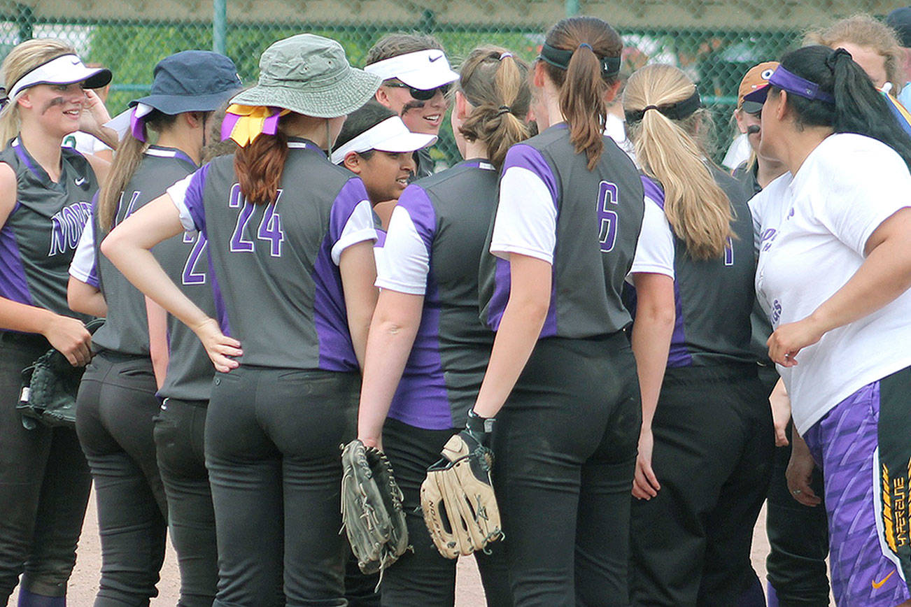 &lt;em&gt;North Kitsap huddles up before its first game against East Valley. &lt;/em&gt;Mark Krulish / Kitsap News Group