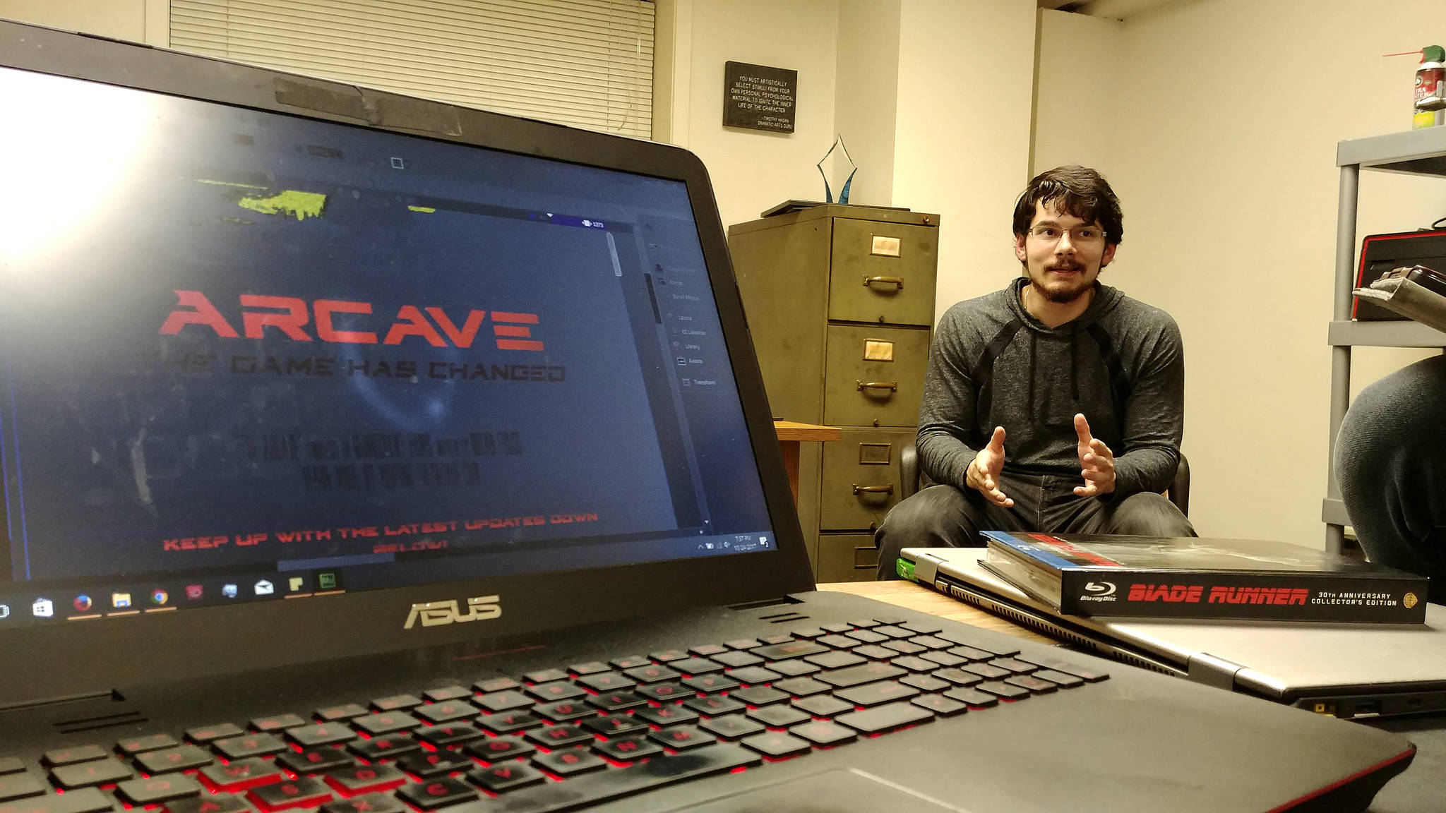 Micah Fusco discusses The Arcave at a meeting with his company, Monoculus Films                                Photo courtesy Arcave Production Staff