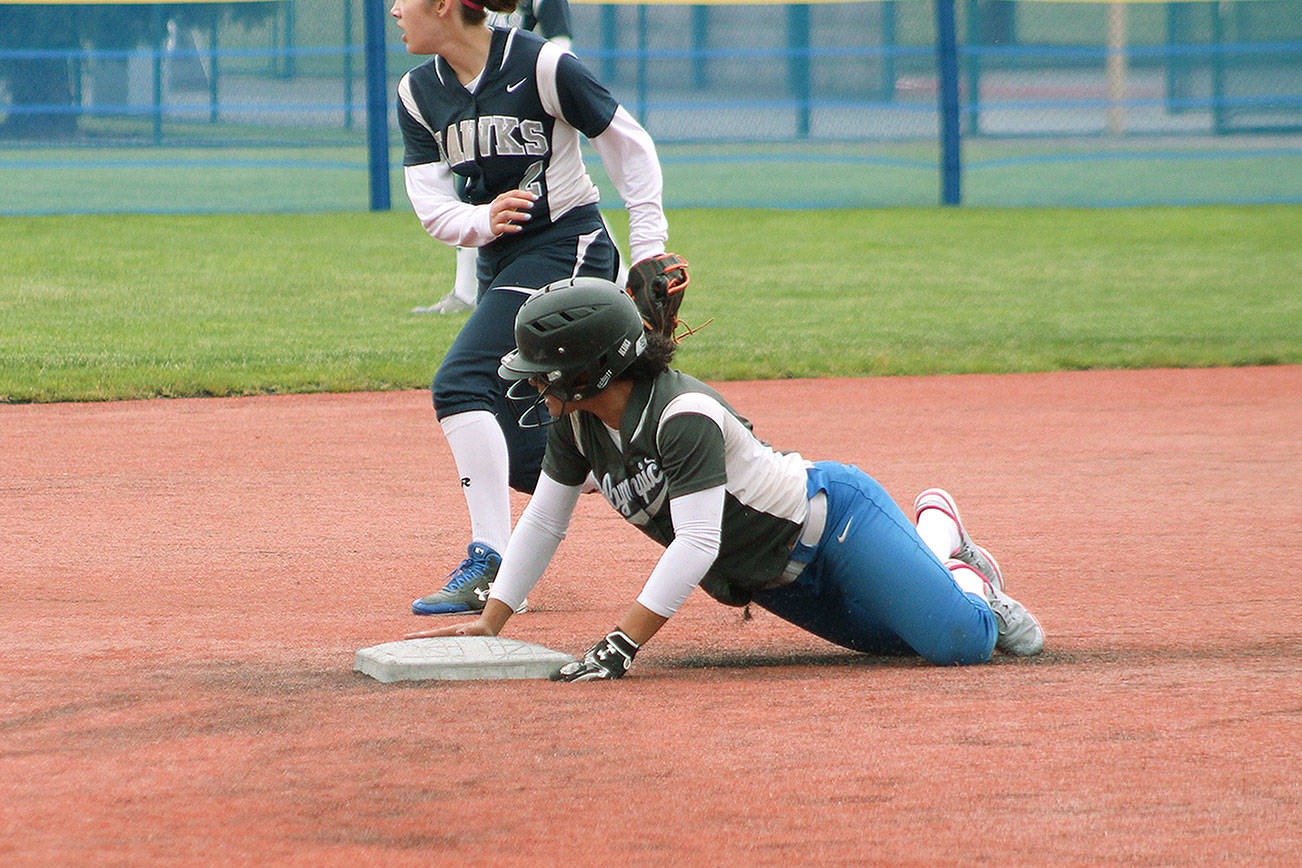 &lt;em&gt;Olympic shortstop Kiki Mitchell slides into second during a district tournament game.&lt;/em&gt;                                Mark Krulish / Kitsap News Group