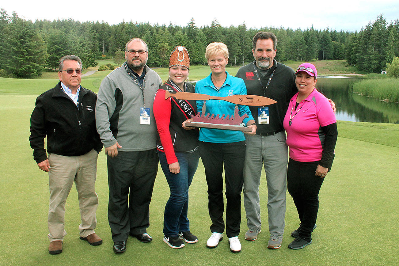 Trish Johnson, the winner of the inaugural Clearwater Legends Cup, stands with Greg George, Sam Askew, Hailey Crow, Leonard Forsman and Irene Carper. (Mark Krulish/Kitsap News Group)