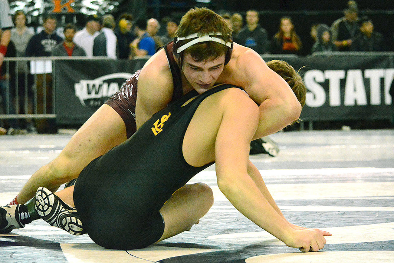Mason Eaglin wrestled his way through the 4A 170-pound weight class at the Mat Classic, culminating in a state championship. (Mark Krulish/Kitsap News Group)