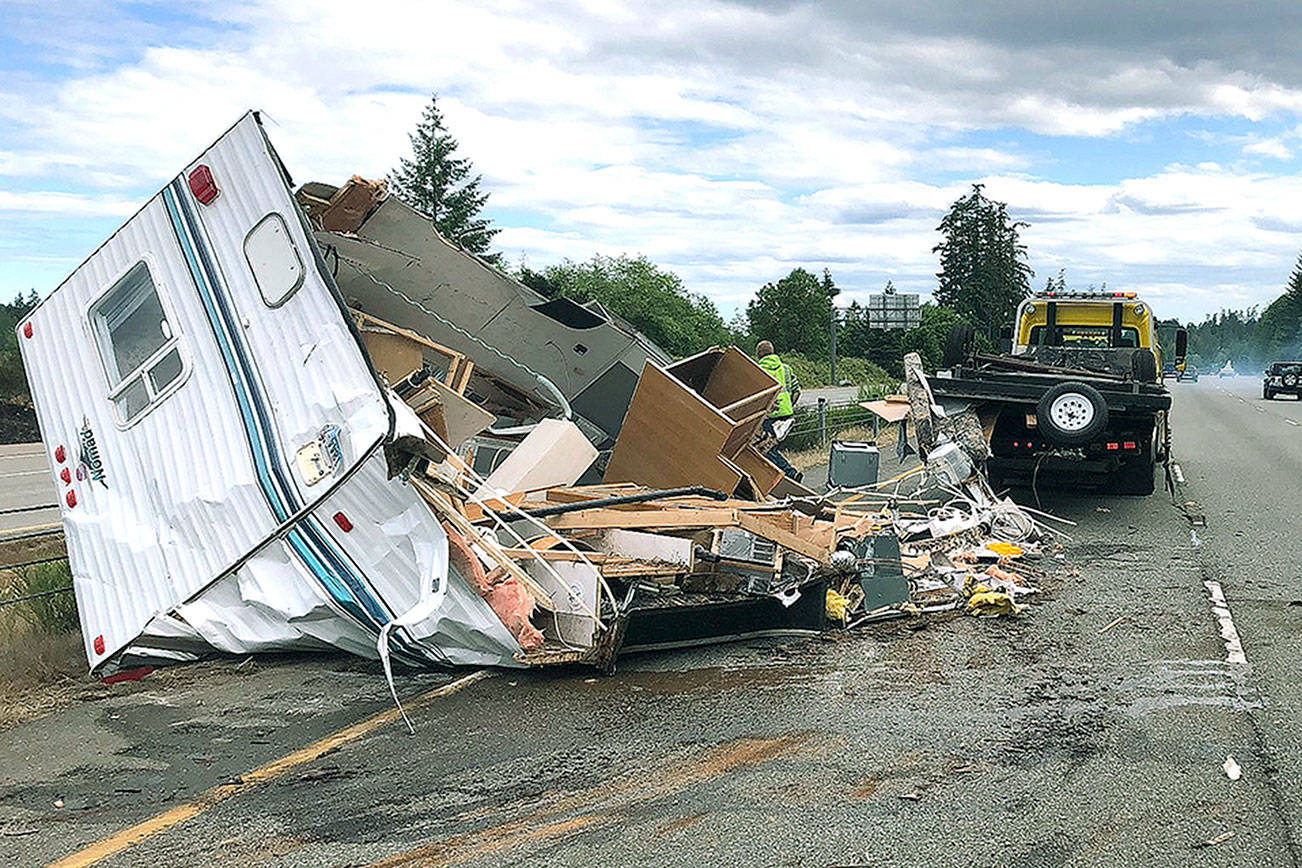 &lt;em&gt;A trailer that had just been purchased in Poulsbo by an Auburn woman and her male passenger flips over on State Route 3 near Trigger Ave. in Silverdale.&lt;/em&gt; Photo courtesy of Washington State Patrol Trooper Chelsea Hodgson
