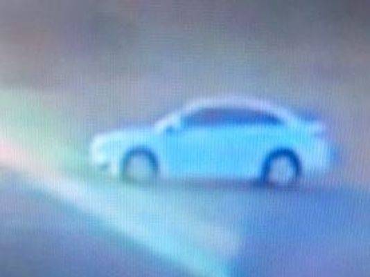 Investigators believe this white vehicle, whose image was captured on surveillance video, was involved in a fatal hit-and-run incident in South Kitsap. They are asking anyone who has seen the sedan to contact the Sheriff’s Office. (Courtesy Kitsap County Sheriff’s Office)