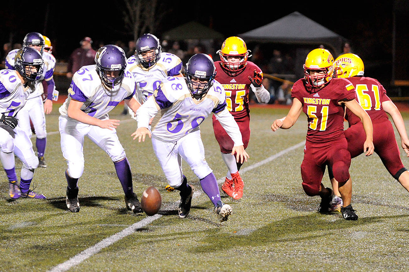 Buccaneers defenders battle with Sequim players for a loose ball. (Michael Dashiell/Sequim Gazette)