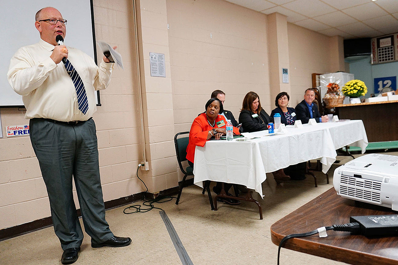 Candidates provide an introduction to Port Orchard Chamber of Commerce members