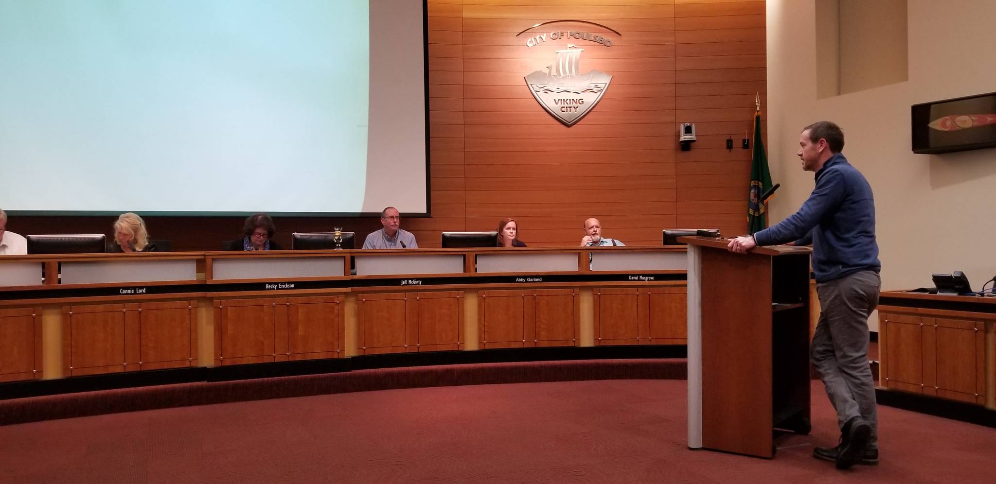 Christopher Piercy, program supervisor for Kitsap County Public Works Solid Waste Division answers the questions of Poulsbo City Council members regarding a possible plastic bag ban, during a Wednesday council meeting. Nick Twietmeyer | Kitsap News Group.
