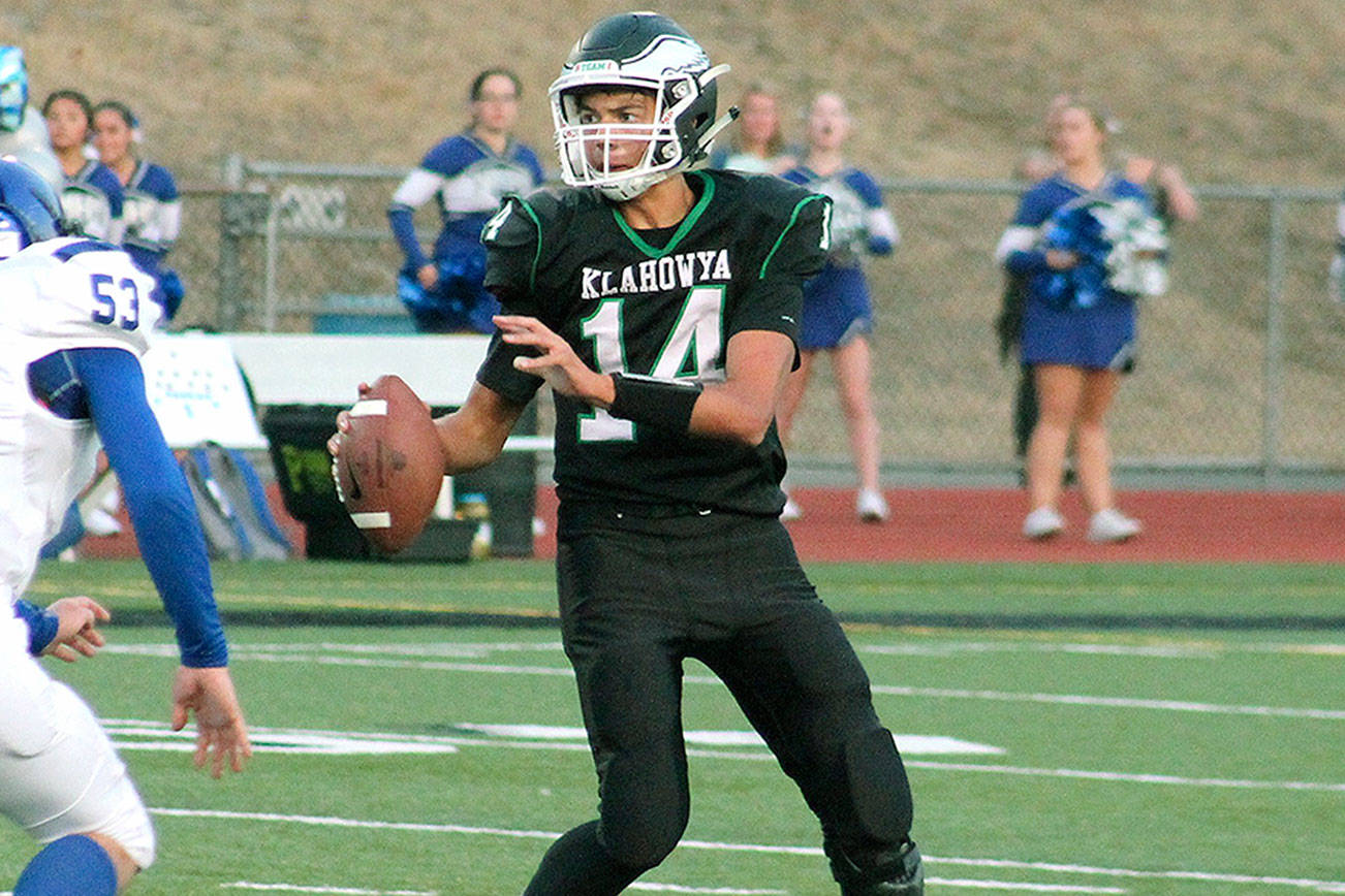 Klahowya quarterback John Hartford threw for a school-record five touchdown passes against Vashon Island. He is currently 636 yards away from Klahowya’s single-season passing record of 1,558 yards. (Mark Krulish/Kitsap News Group)