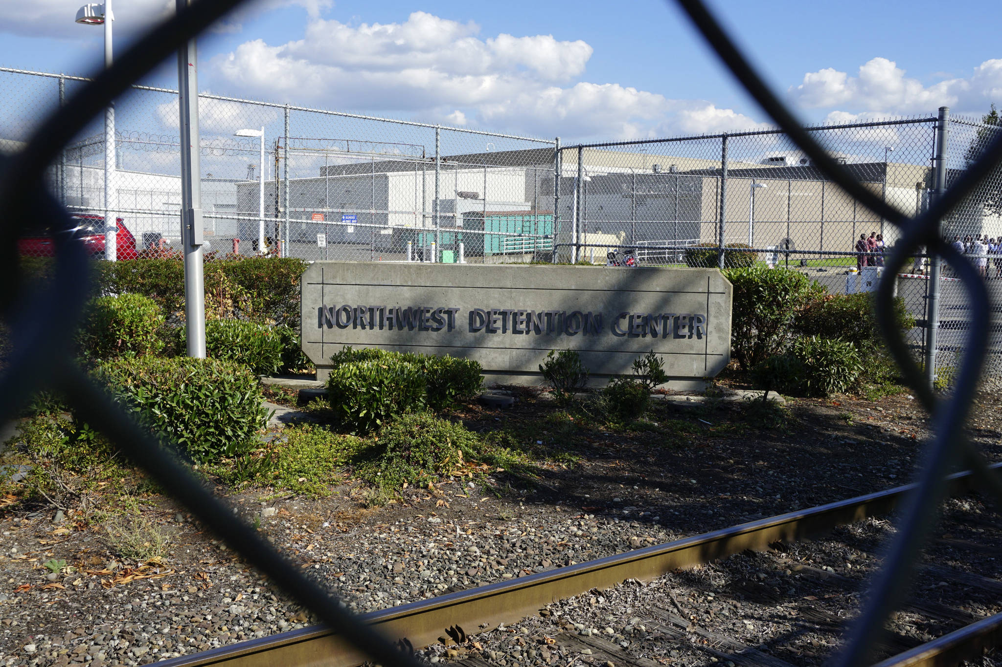 Tacoma’s Northwest Detention Center is run by Florida-based GEO Group. Photo by Melissa Hellmann