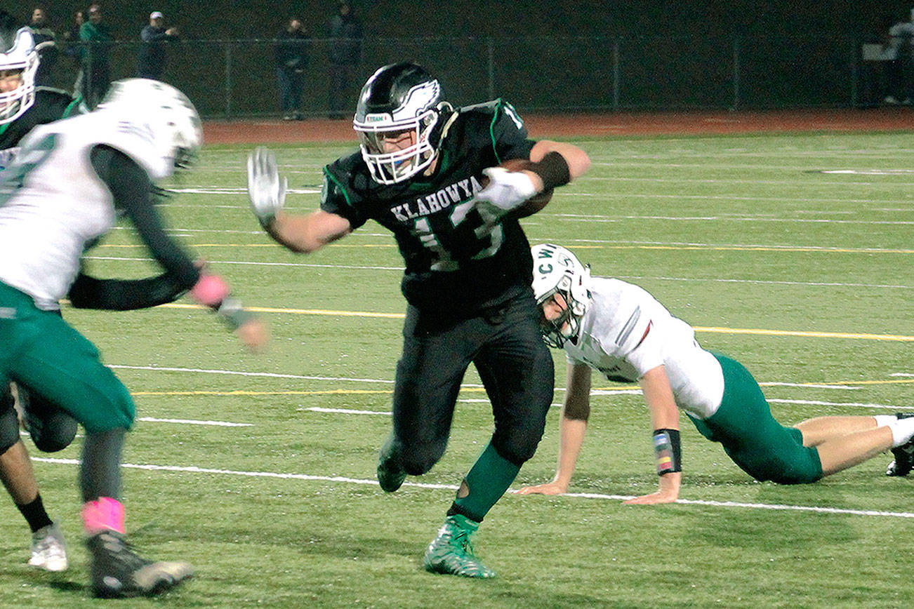 Hunter Wallis scored four touchdowns for Klahowya in a 44-20 win over Charles Wright Academy. Wallis rushed for 109 yards and three scores and returned an interception for a touchdown. (Mark Krulish/Kitsap News Group)