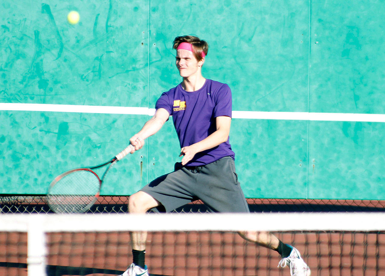 North Kitsap’s Max Larsen and his doubles partner, Ryland Schmidt, defeated Sequim’s Nate Despain and Ryan Tolberd, 4-6, 6-1, 6-1, in the first round of the doubles tournament. (Mark Krulish/Kitsap News Group)