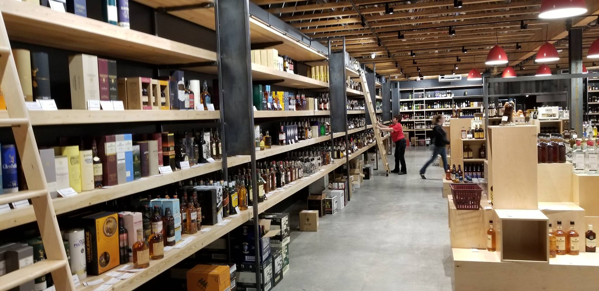 High Spirits new location in the Century Building features a sprawling selection of spirits, a 1,000 square-foot walk-in “beer cave,” a 3,000 square-foot wine cellar and classroom and even a station dedicated to refilling growlers. Nick Twietmeyer | Kitsap News Group.