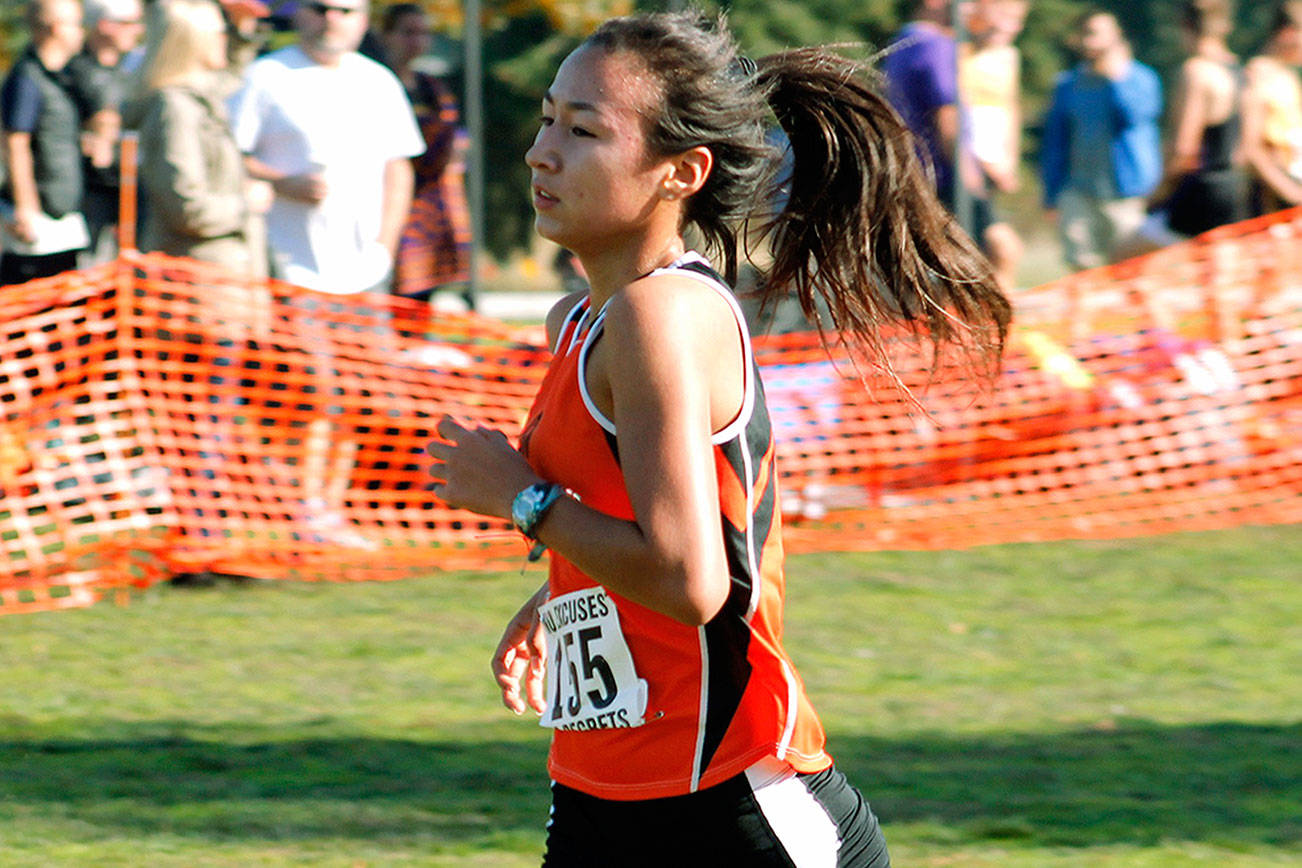 Maya Nichols won her second consecutive South Sound Conference championship with a time of 19:00.20, leading Central Kitsap to a team title as well. (Mark Krulish/Kitsap News Group).