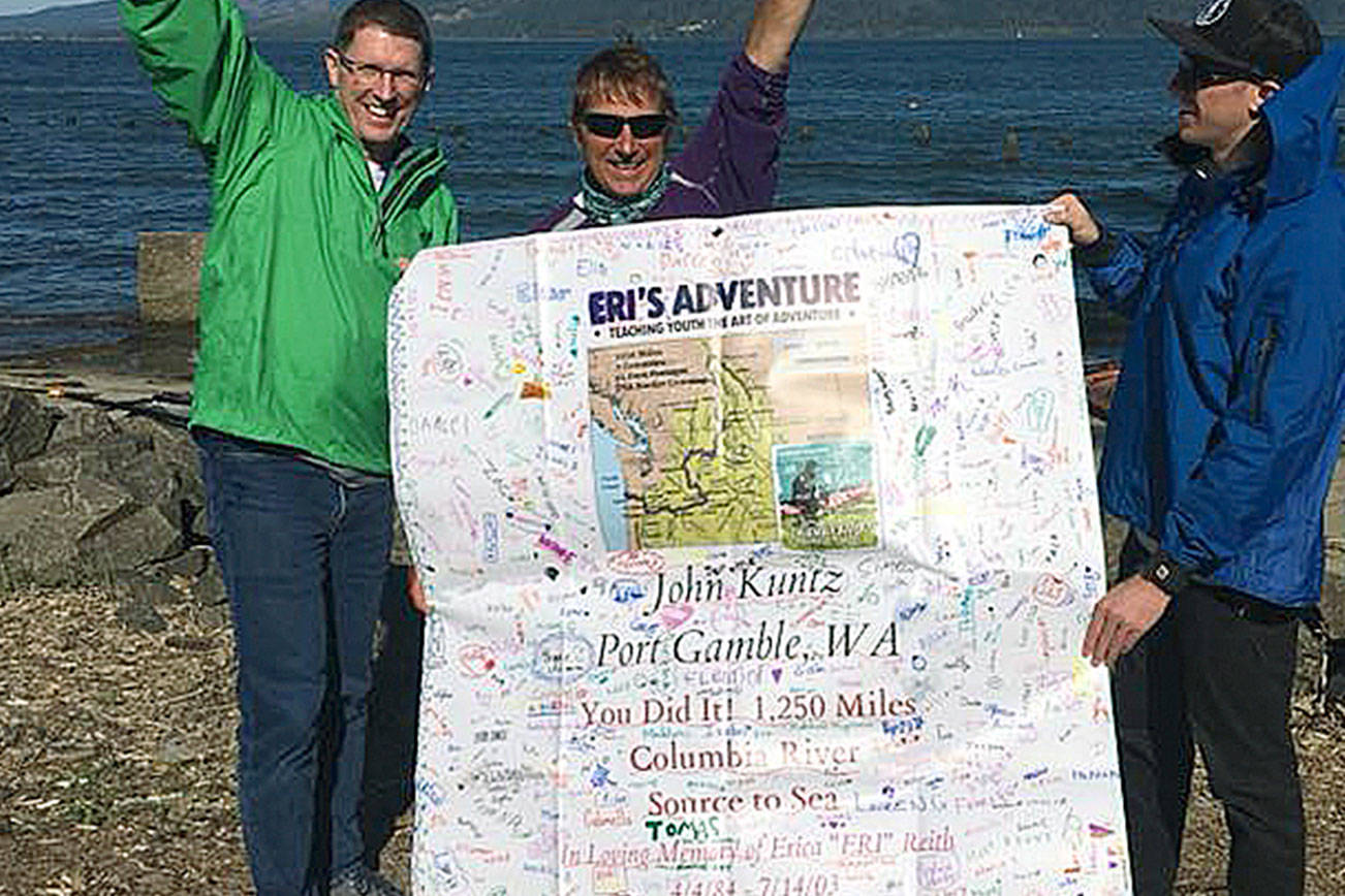 John Kuntz celebrates the completion of the Source to the Sea journey on the coast of Oregon. (Photo courtesy John Kuntz)