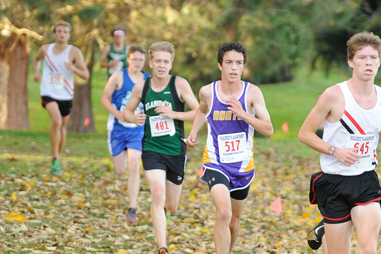 North Kitsap’s Max Metters and Klahowya’s Jaeden Ellis were among the top boys finishers in the 2A district race. (Michael Dashiell/Sequim Gazette)