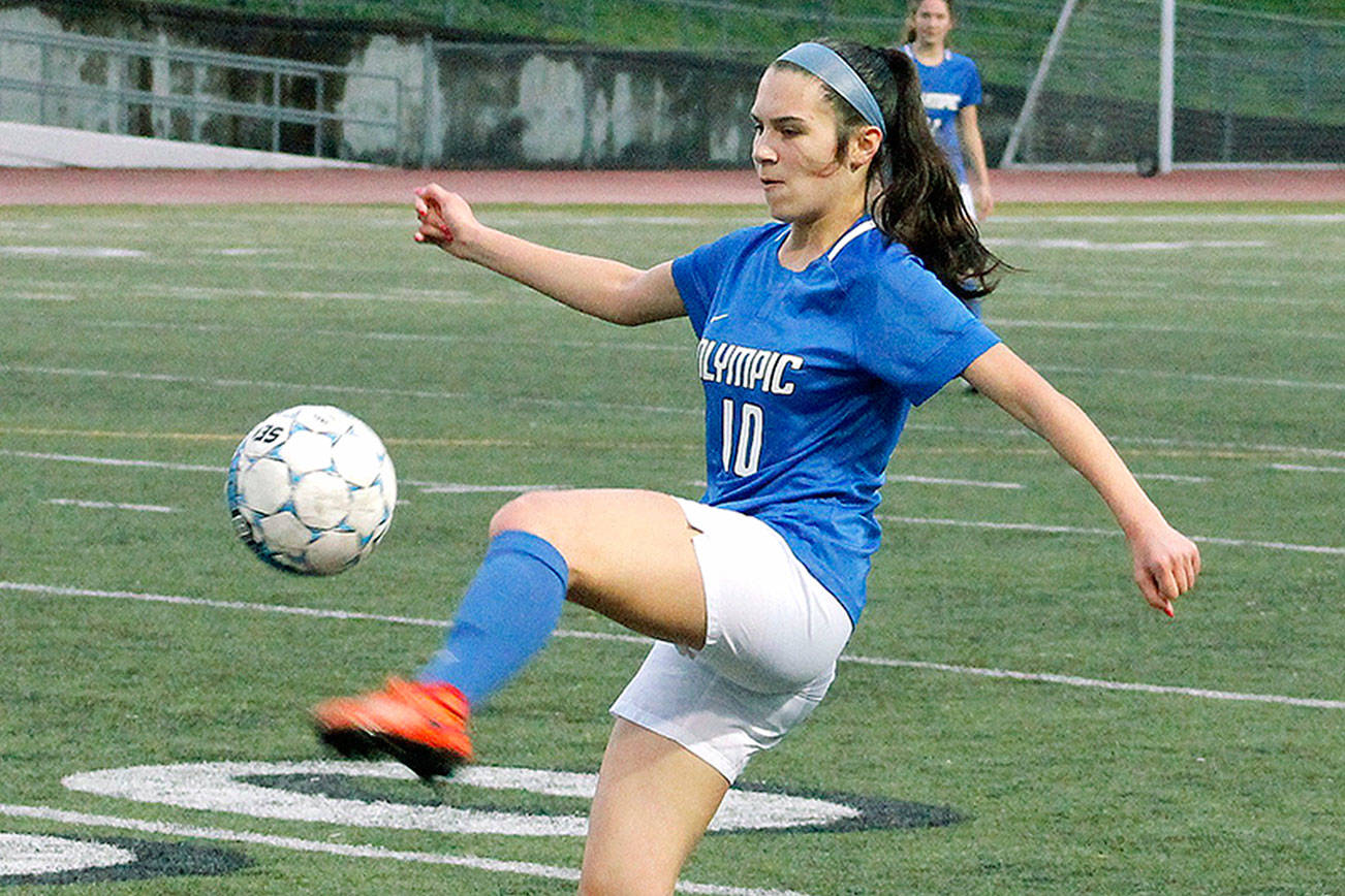 Melenia Wright corrals a ball during Olympic’s district game against Fife. (Mark Krulish/Kitsap News Group)