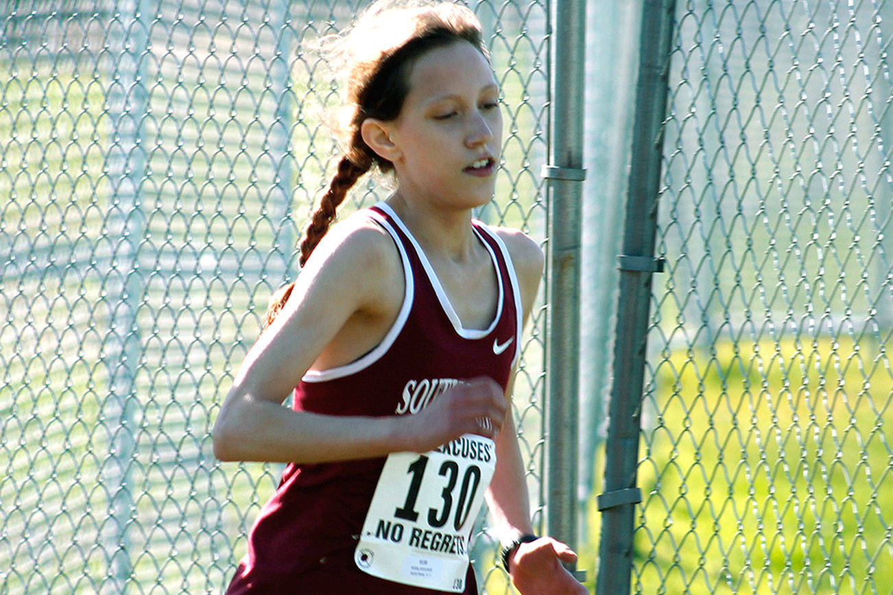 South Kitsap’s Ashley Sciocchetti runs near the head of the pack during the SPSL championships. (Mark Krulish/Kitsap News Group)