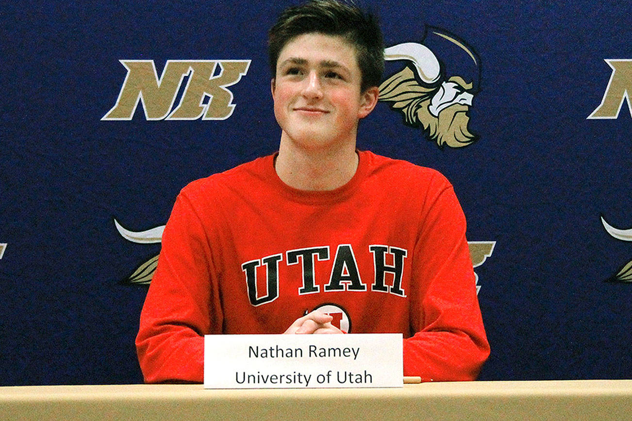 North Kitsap swimmer Nathan Ramey signs to swim at the University of Utah. (Mark Krulish/Kitsap News Group)