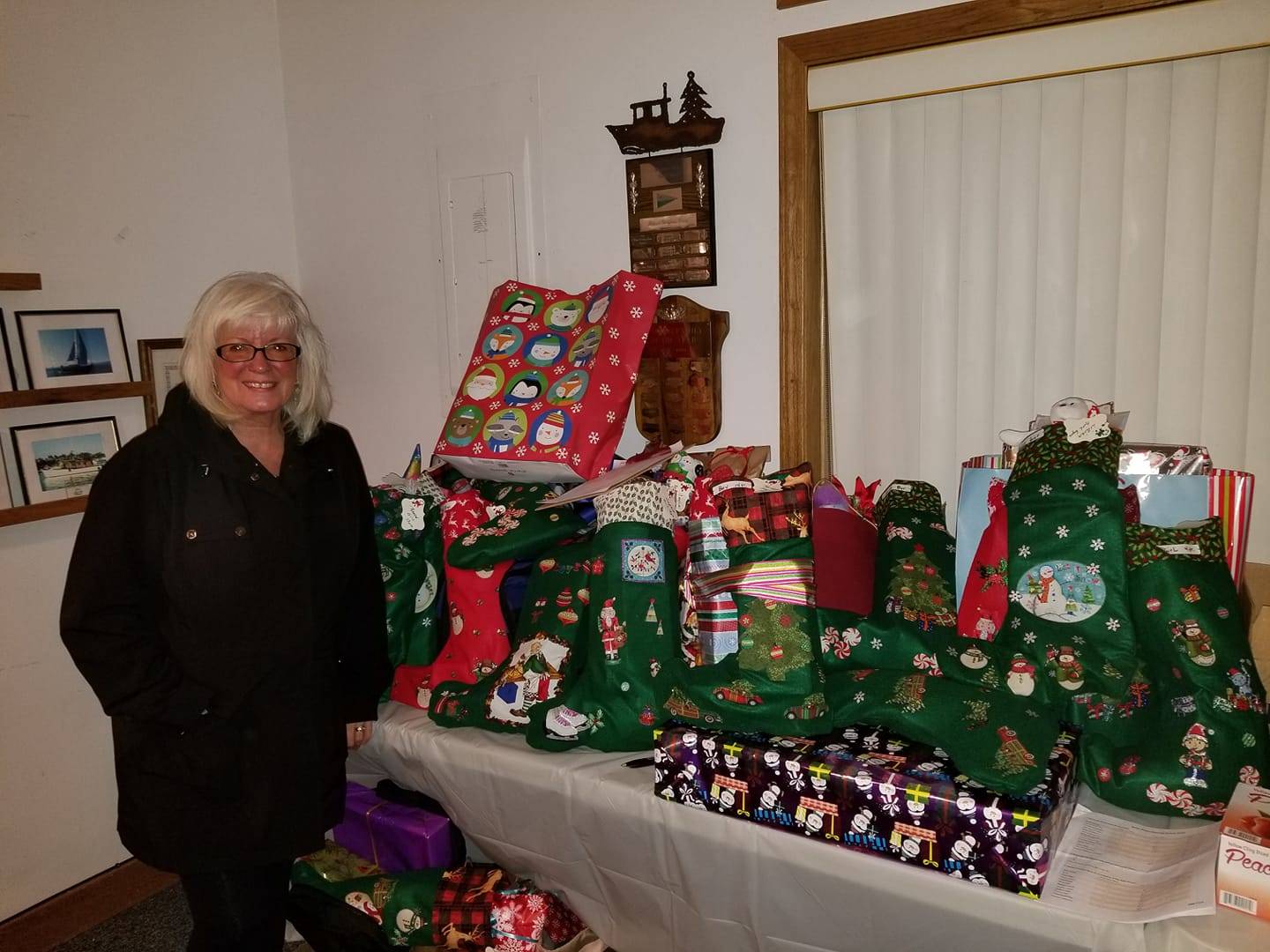 Kingston Cove Yacht Club spreads cheer through donated stockings