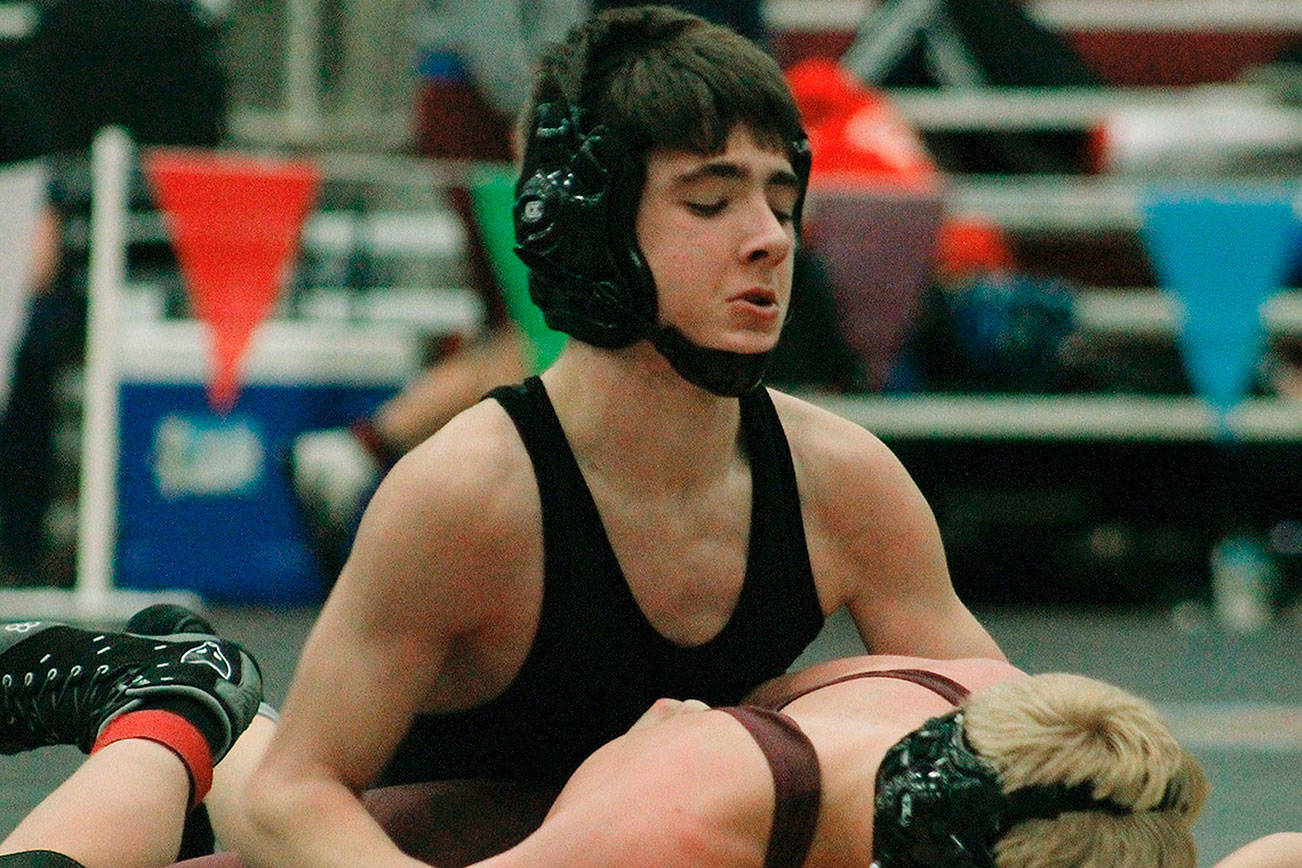 Klahowya 106-pounder Kelton Gagnon beats White River’s Colton Reeves by technical fall in the third round of the HammerHead Invitational. (Mark Krulish/Kitsap News Group)