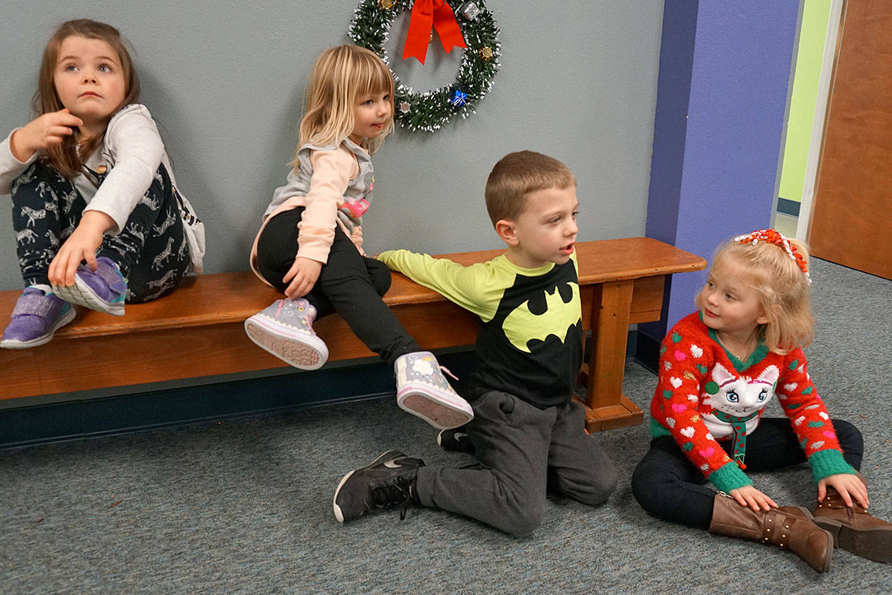 Kids weigh in on Christmas joy, reindeers and presents under the tree