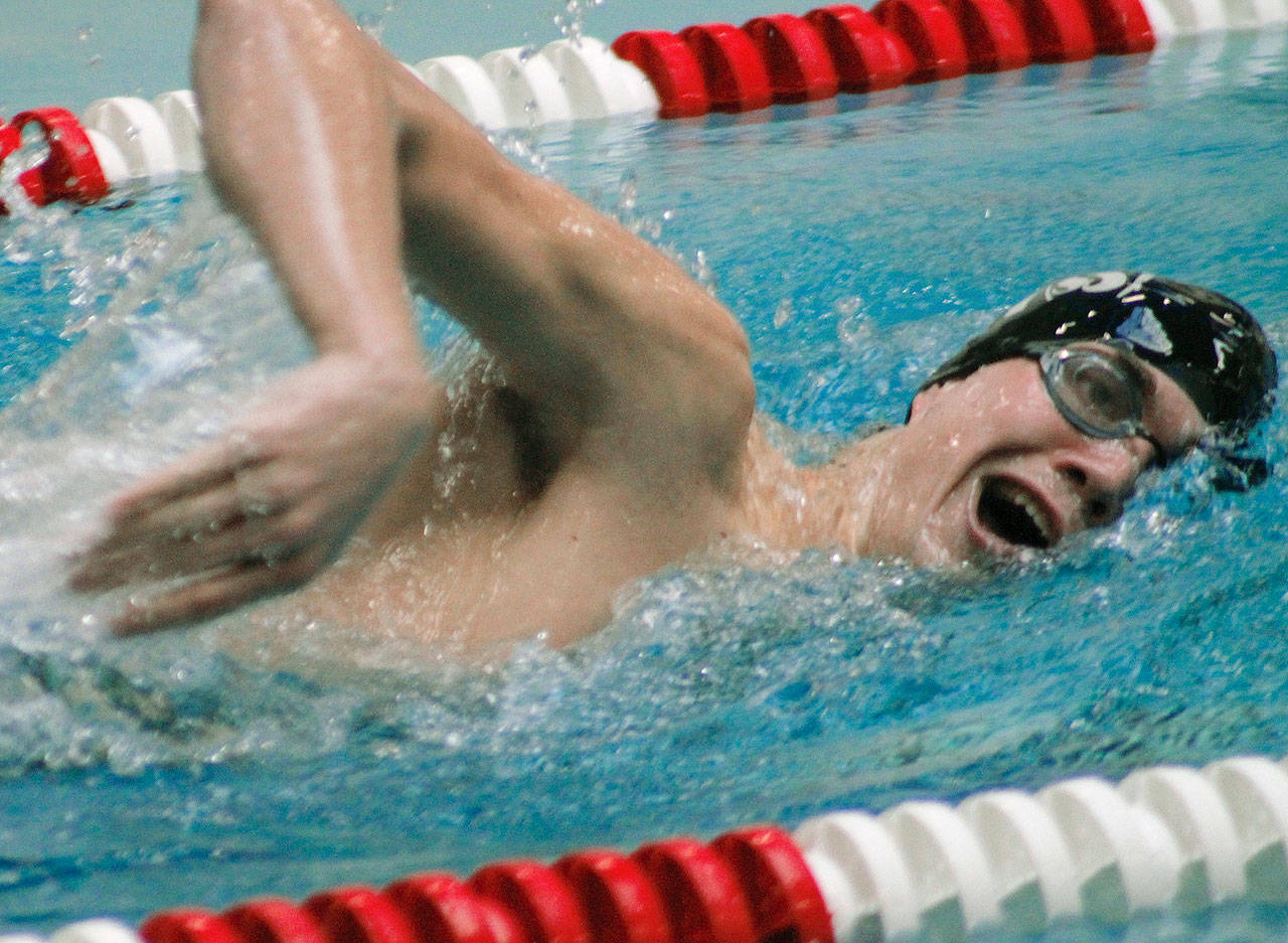 Sam Cook helped Klahowya to a fourth place finish at the Swimvitational. Here he swims the 200-yard freestyle. (Mark Krulish/Kitsap News Group)