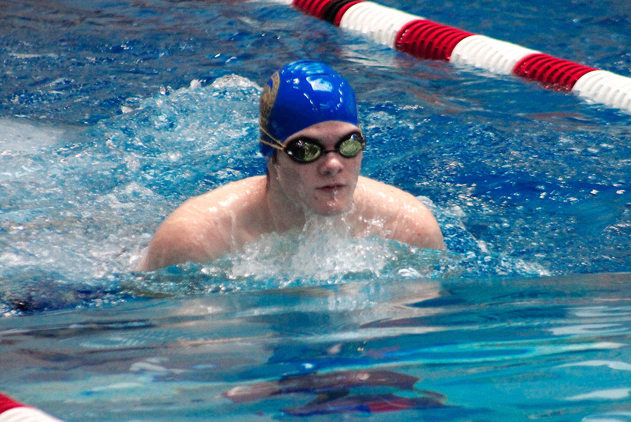 Jeriah Smith of Bremerton takes on the field in the 100-yard breaststroke. (Mark Krulish/Kitsap News Group)