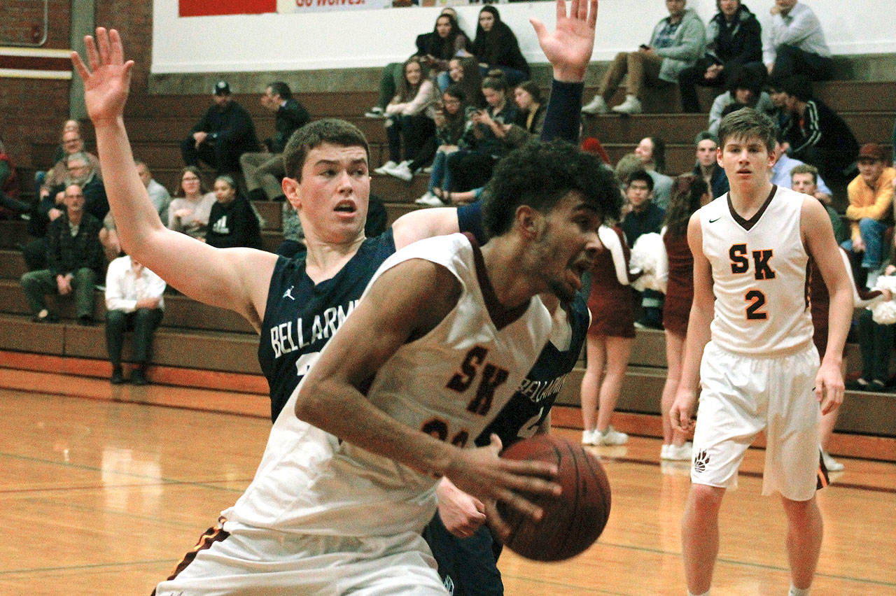 South Kitsap senior DeAnte Ward drives the lane against Bellarmine. He led the Wolves with 12 points in a 36-30 victory. (Mark Krulish/Kitsap News Group)