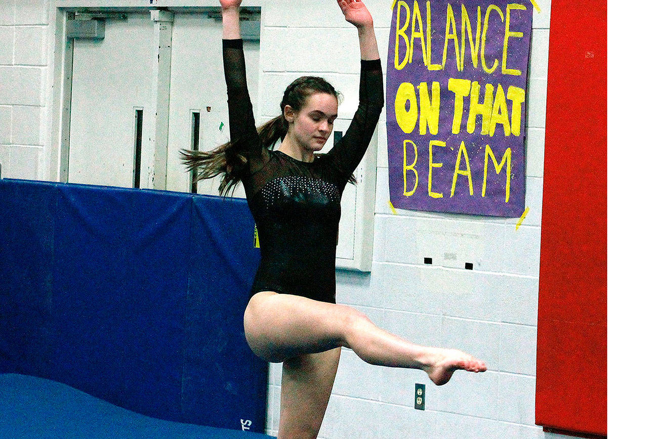 Ginger Silfies scored a 7.0 for her floor routine in the meet with Shorewood and Shorecrest. (Mark Krulish/Kitsap News Group)