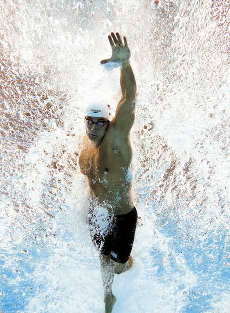 Nathan Adrian swims the 100-meter freestyle in the 2012 Summer Olympics in London.