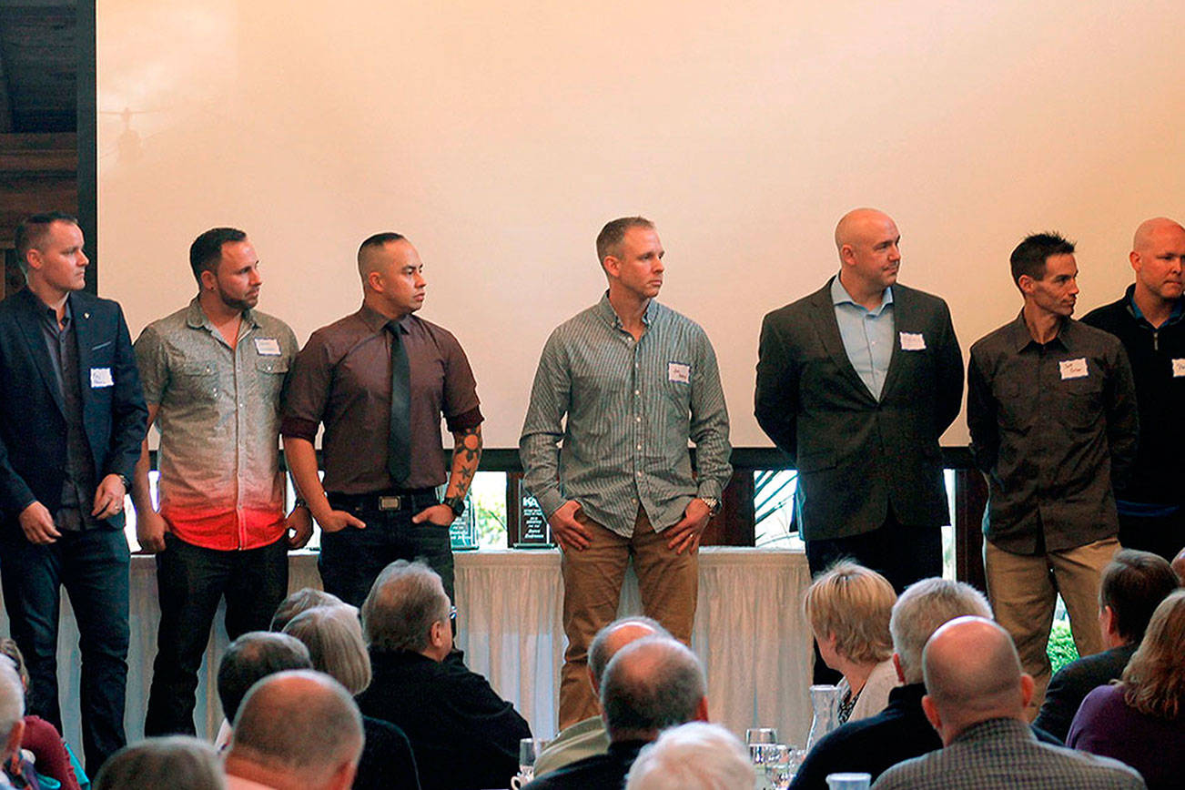 Members of the 1996 South Kitsap baseball team, which won the 3A state championship, take the stage. (Mark Krulish/Kitsap News Group)