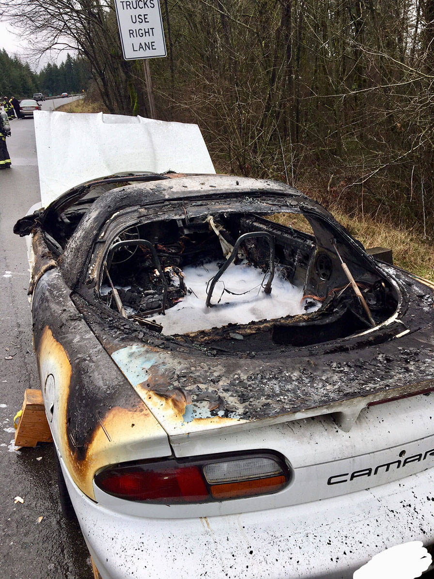 A 2000 Camaro damaged in a car fire near Silverdale on January 10. State troopers said the fire was caused by lit cigarette. (Washington State Patrol)