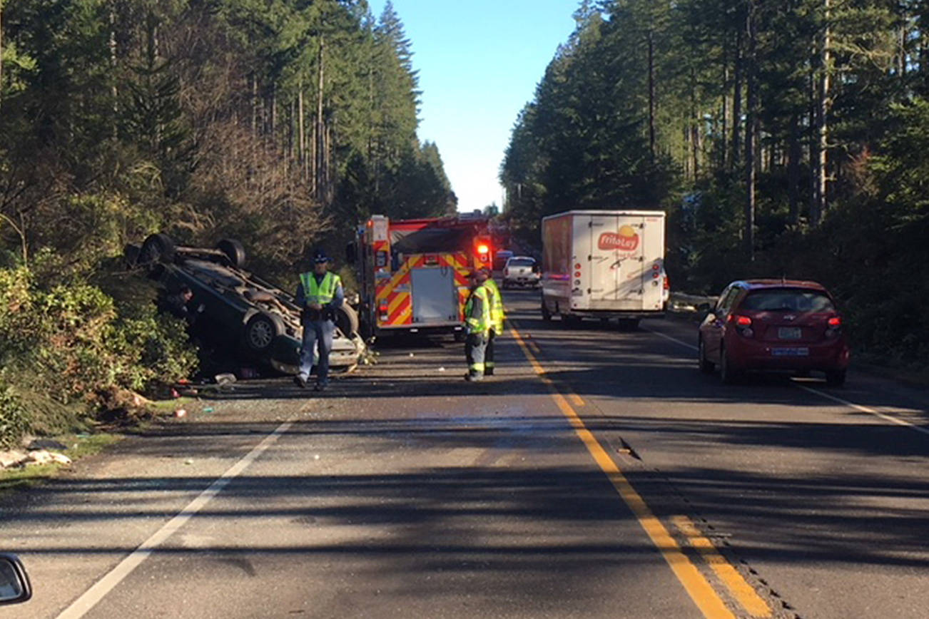 Driver distracted by phone causes rollover crash in Bremerton