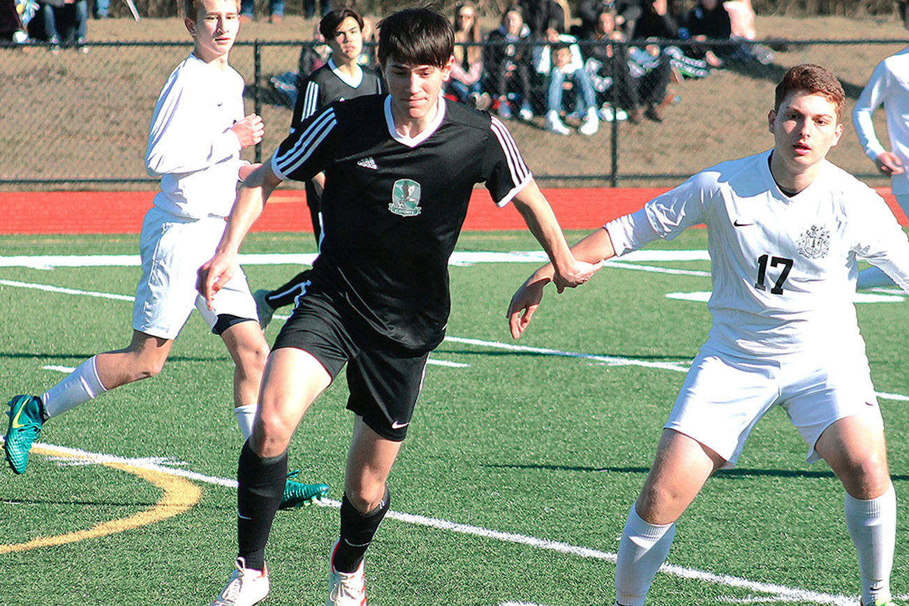 Klahowya sophomore Matthew Hytinen chases down a loose ball against Central Kitsap. (Mark Krulish/Kitsap News Group)