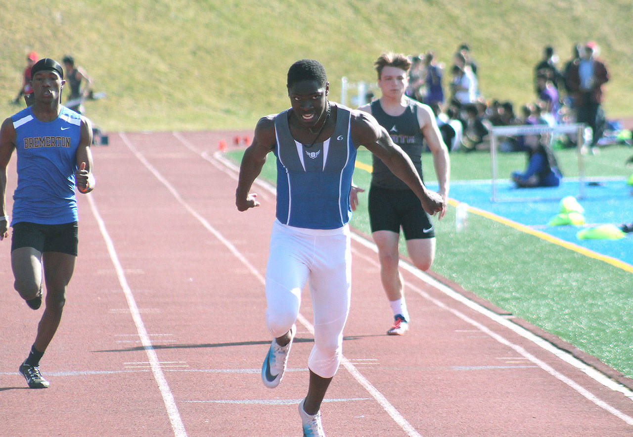 Malcolm Dewalt took home the top times in the 100 and 200 against runners from North Kitsap and Bremerton at this early season meet. (Mark Krulish/KItsap News Group)