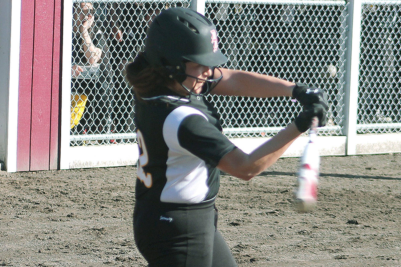 Sarah Hoyt connects for a base hit against Puyallup. (Mark Krulish/Kitsap News Group)